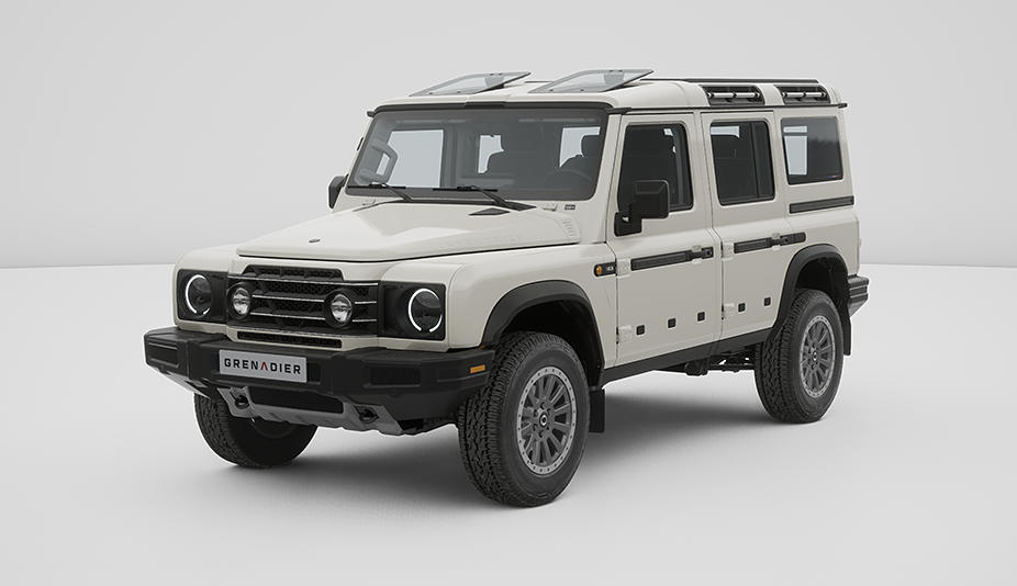Biały Ineos Grenadier FIELDMASTER EDITION, terenowy SUV o kanciastej sylwetce. Masywne opony i mocna konstrukcja.